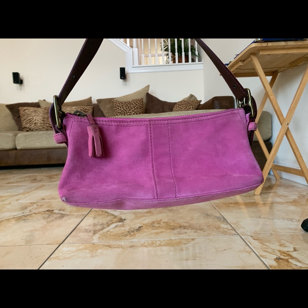 Small magenta suede shoulder bag by Coach